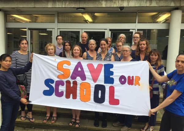 Campaigners calling for Broad Oak Community School near Heathfield to be saved outside County Hall