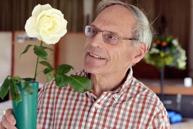 David Donovan with his rose. Picture: Kate Shemilt ks190390-4