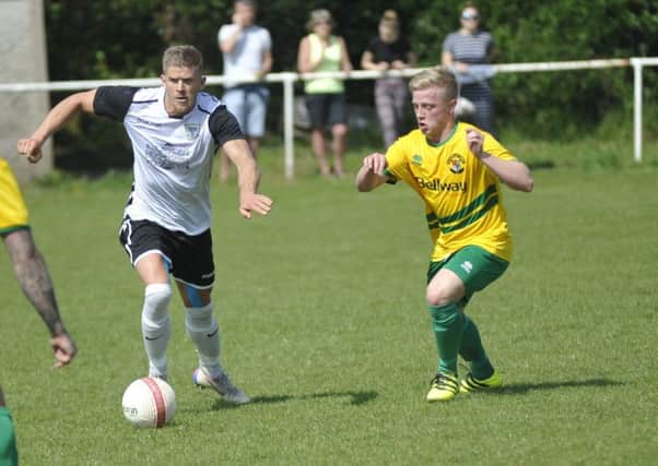 Jack Shonk on the ball for Bexhill United against Hailsham Town on Easter Monday. Picture by Simon Newstead