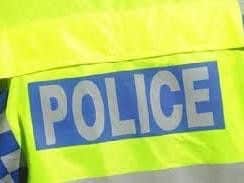 Police are appealing for witnesses after a cyclist was  beaten unconscious  and robbed in a Crawley street