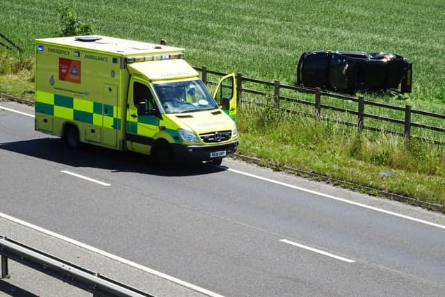 The A27 near Angmering has been partially closed after a car crashed into a field