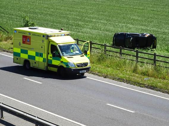 The A27 near Angmering has been partially closed after a car crashed into a field