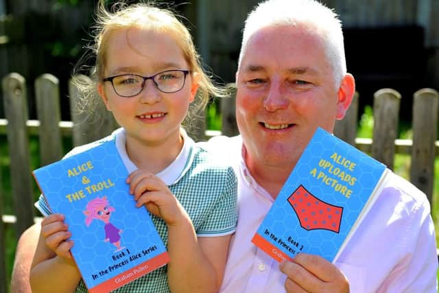 Graham Pullen, Self-published author writes books on internet safety with the help of his daughter Hollie-April. Pic Steve Robards