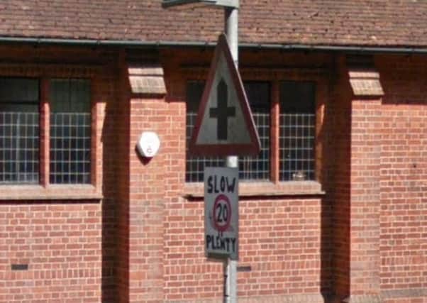 A Google Street View image taken in August 2018 shows a makeshift 20mph sign in the road