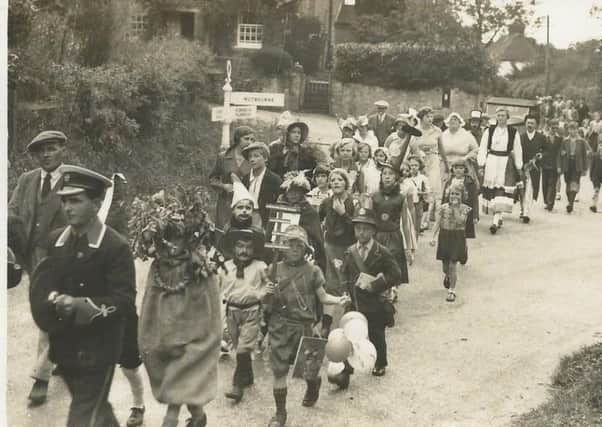 West Chiltington Village SHow procession on its way to Gadds Meadow in 1934 SUS-190307-135137001