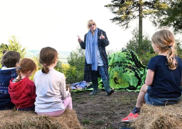 A storyteller at the launch of  The Fish, The Goatsucker and The Highwayman at Blackdown