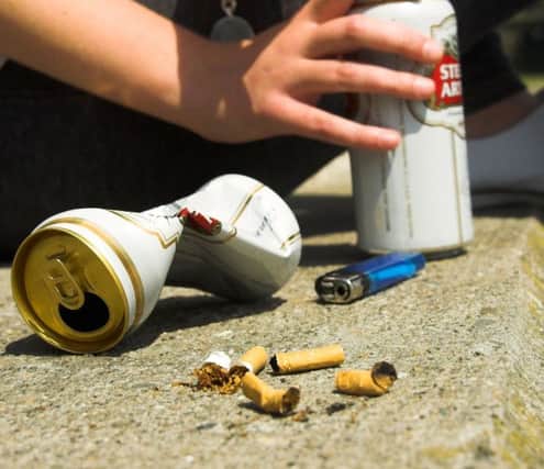ANTI-SOCIAL BEHAVIOUR - Teenagers drinking alcohol and smoking on the streets