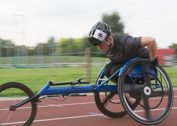 Wheelchair racer Lizzie Williams from Worthing has launched a career comeback and is looking for businesses to sponsor her. Picture: Martin Barraud