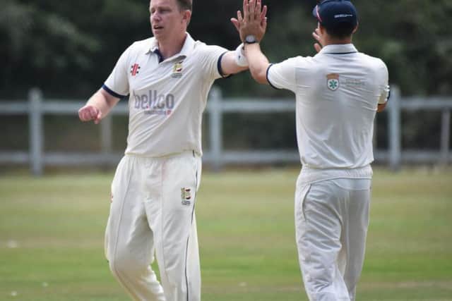 John Morgan celebrates his wicket. Picture by Justin Lycett