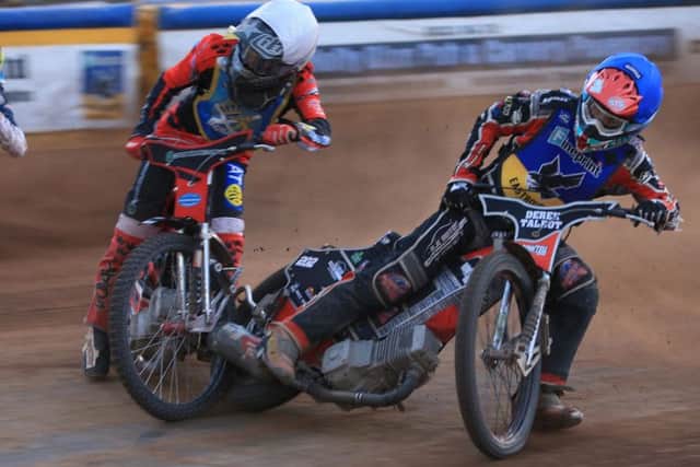Edinburgh's Joel Andersson tangles with Eastbourne's Alfie Bowtell. All pictures by Mike Hinves