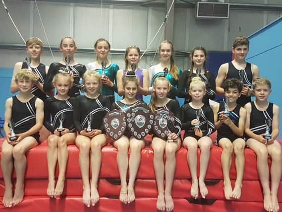 Hollington Gymnastics Club celebrating their tumble squad successes at the Sussex Championships