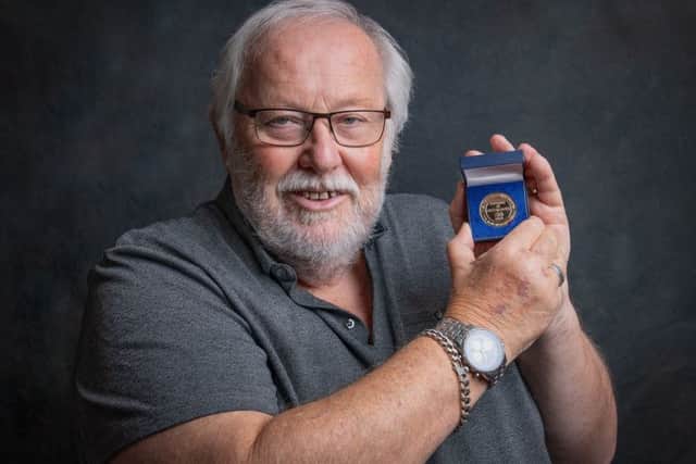 David Robertson with his medal from Diabetes UK. Photo Credit: Nikki Goodeve, The Photography Fairy SUS-190907-132925001