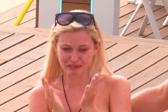 Amy telling the islanders she will be leaving. Picture: ITV