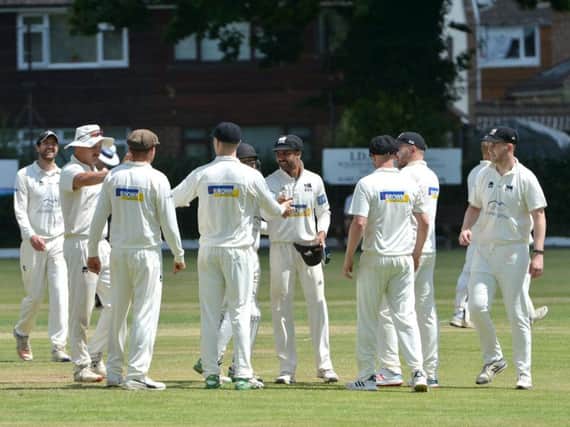 Roffey celebrate a wicket during Saturday's win over Brighton & Hove. All pictures by Peter Cripps