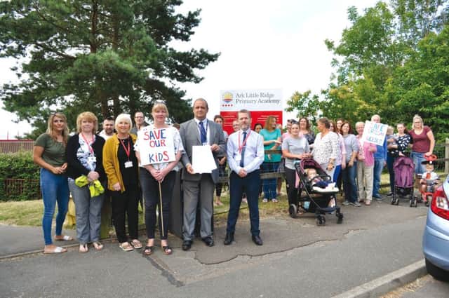 Cllr John Rankin with campaigners outside Ark Little Ridge Academy SUS-190724-143945001