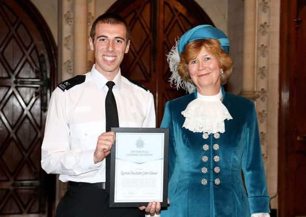 Special Constable Jake Sloane receiving his award at the West Sussex awards ceremony