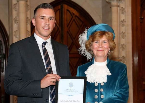 DC Adam Tidy was presented with his award by High Sheriff of West Sussex Davina Irwin-Clark SUS-191107-164802001