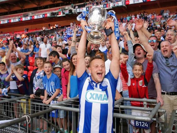 Shane Cooper-Clark of Thatcham Town celebrates after winning the Builbase FA Vase Final against Stockton Town (Photo by Henry Browne/Getty Images)