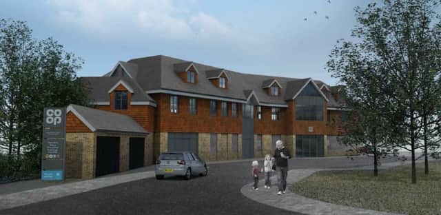 Artist's impression of a new Co-op and flats planned for Loxwood SUS-191207-160342001