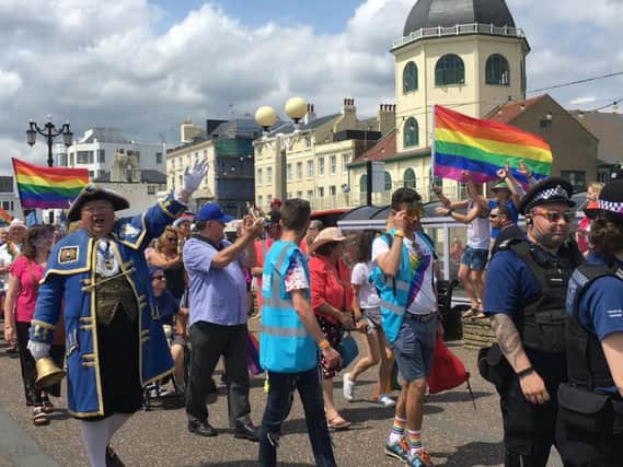 Town crier Bob Smytherman with the Worthing Pride parade