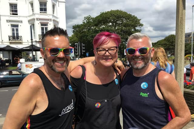 Dan and Gary Foster-Syddall with Sue Coleman at Worthing Pride