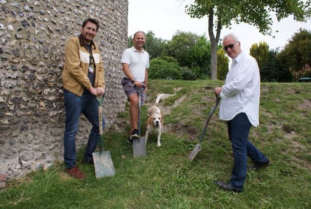 Dig in Motcombe SUS-190715-091512001 L-R Jo Seaman (Eastbourne Borough Council), Councillor Jonathan Dow and Chris Searle (Friends of Motcombe Gardens)