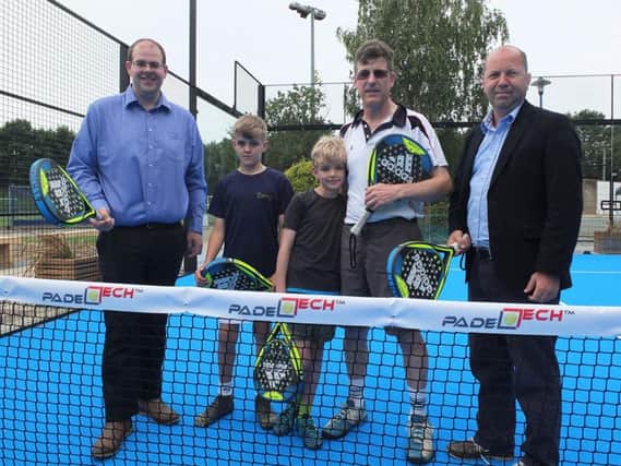 (from left to right) Councillor Jonathan Ash-Edwards, Leader of Mid Sussex District Council, padel tennis players Patrick and Edward with their dad Piers and Councillor John Belsey, MSDC Cabinet Member for Environment and Service Delivery.