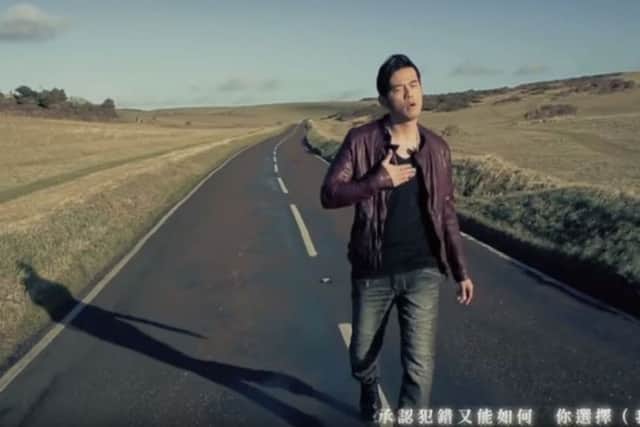 A still from Jay Chou's music video for What's Wrong SUS-190716-160945001
