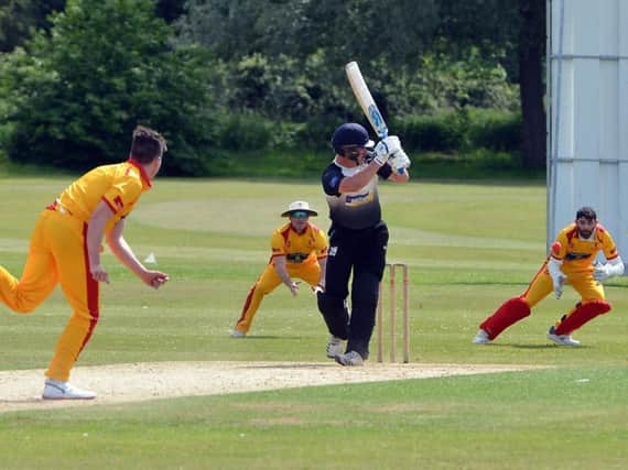 Action from June's game between Horsham and Roffey. Picture by Steve Robards