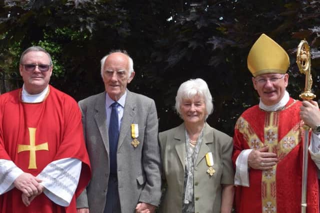 Benemerenti Medal award recipients Patrick and Sheila Dunbar with Bishop Richard Moth and Rev Fr Daryl George