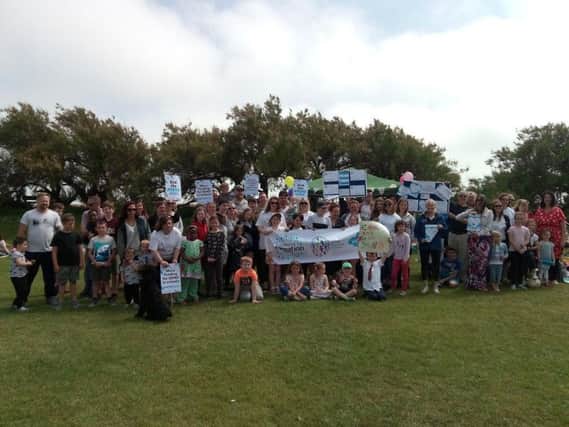 Families marched in protest against SEND funding cuts in Worthing last month
