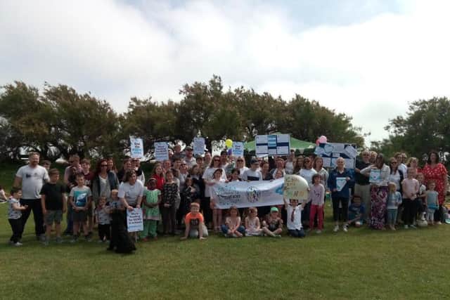 Families marched in protest against SEND funding cuts in Worthing last month
