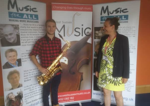 Austin with his teacher Kate, from West Sussex Music