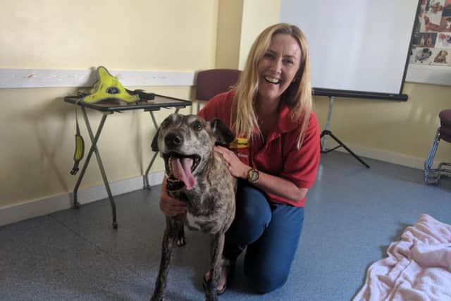 Donna Taylor, volunteer and canine myotherapist, and Benny