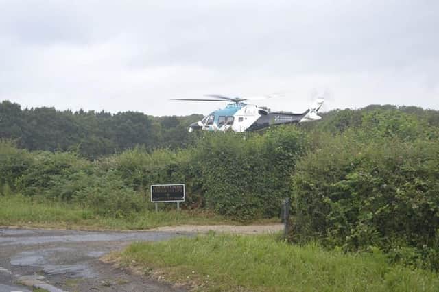 An air ambulance was called to the A22 at Golden Cross. Photo by Lewis Isted SUS-190719-181139001