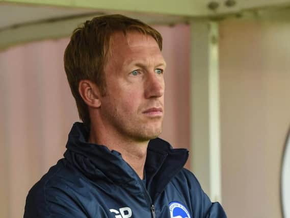 Graham Potter watches on at Crawley Town. Picture by Phil Westlake/PW Sporting Photography
