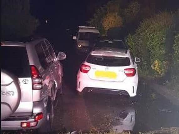 The white Mercedes collided with three parked vehicles. Picture: Chichester Police