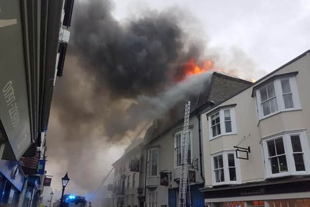 The George in Rye hotel on fire yesterday (July 20). Picture: Elaine Thomas