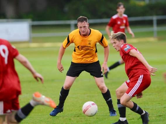 Action from Worthing's friendly at Littlehampton. Picture by Stephen Goodger