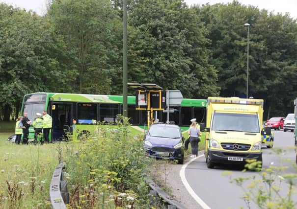 Scene of the A24 crash today between a bus and a car at Washington roundabout. Photo: Eddie Mitchell SUS-190722-105558001