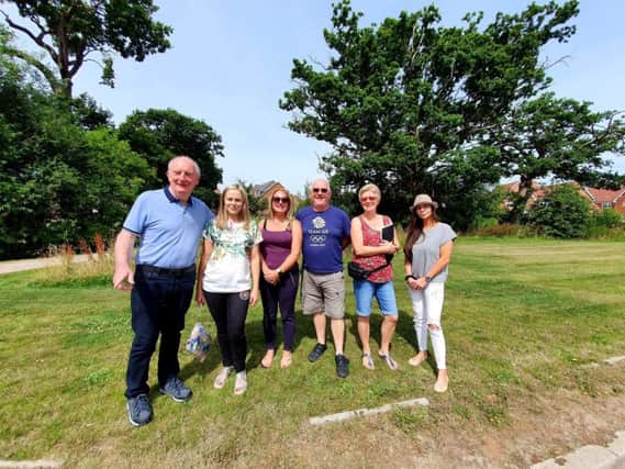 Some of the residents of the Wickhurst Green estate who are angry at spiralling service charges SUS-190722-131338001