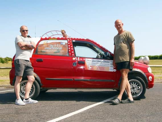 Toby Harris, left, and Simon Clube, have organised a Top Gear-esque, 5,000 mile challenge across Europe and Africa for charity. Picture: Derek Martin