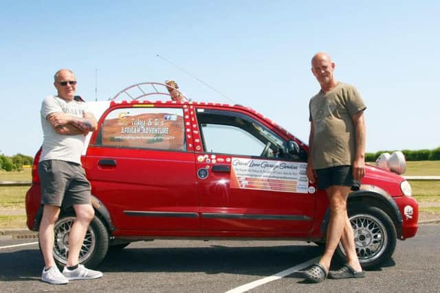 Toby Harris, left, and Simon Clube, have organised a Top Gear-esque, 5,000 mile challenge across Europe and Africa for charity. Picture: Derek Martin
