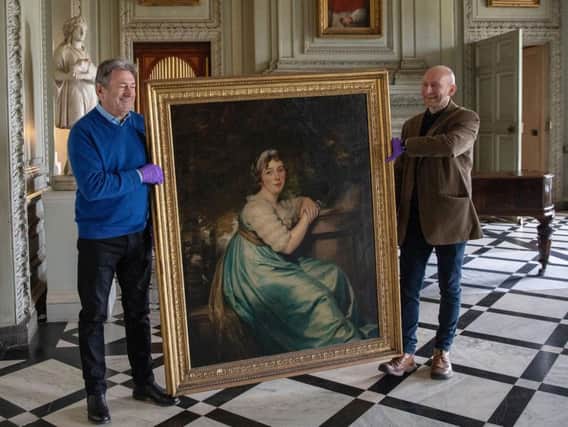 Alan Titchmarsh, helping to rehang part of the National Trust's collection at Petworth House with the trust's Andrew Loukes. Photo: Anna Gordon/Spun Gold TV