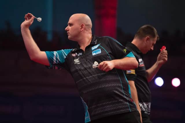 Rob Cross in last 16 action. Picture by Lawrence Lustig/PDC