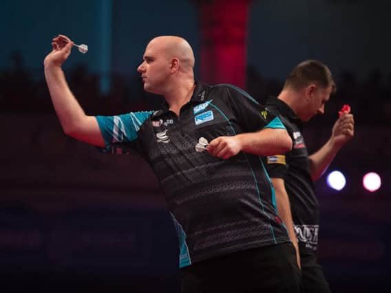 Rob Cross in last 16 action. Picture by Lawrence Lustig/PDC