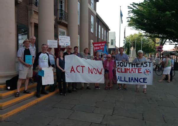 Campaigners outside Worthing town hall before Tuesday night's meeting