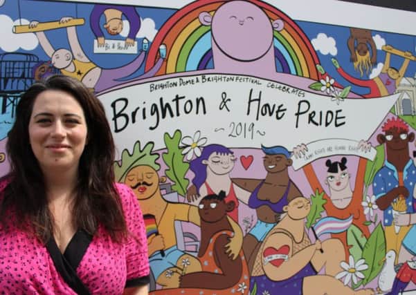Ella Morris and her Pride mural