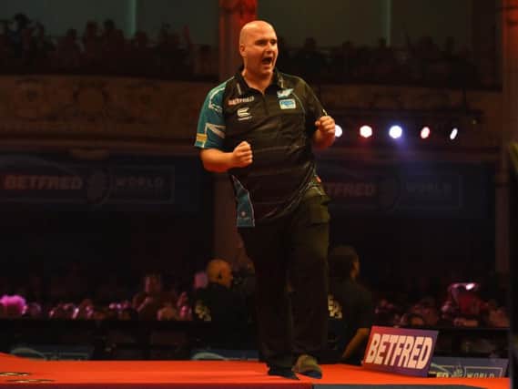 Rob Cross celebrates. Picture by Chris Dean/PDC