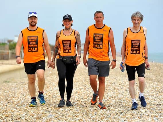 Paul Shepherd (3rd from left) tried to kill himself on Bognor beach - setting out now to walk to London to celebrate his recovery. Pic Steve Robards SR1918507
Left to right, Jon, Jenna, Paul and Phil.